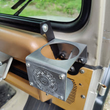 Cargar imagen en el visor de la galería, Metal cup holder with USCG logo mounted to dash of Jeep Wrangler YJ