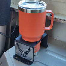 Cargar imagen en el visor de la galería, Steel cup holder with US Air Force logo in rear of Jeep YJ