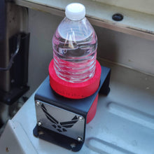 Cargar imagen en el visor de la galería, Steel cup holder with US Air Force logo in rear of Jeep YJ