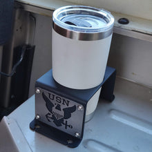 Load image into Gallery viewer, Metal cup holder with USN logo in rear of Jeep Wrangler YJ
