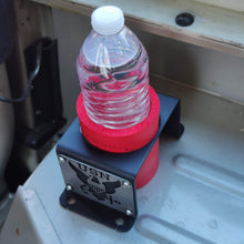 Load image into Gallery viewer, Metal cup holder with USN logo in rear of Jeep Wrangler YJ