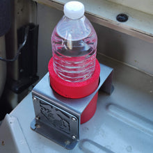 Load image into Gallery viewer, Metal cup holder with USMC logo in rear of Jeep Wrangler YJ
