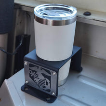 Load image into Gallery viewer, Metal cup holder with USMC logo in rear of Jeep Wrangler YJ