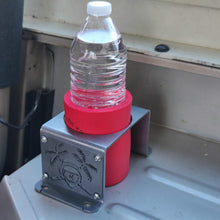 Load image into Gallery viewer, Metal cup holder mounted in rear of Jeep YJ
