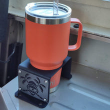 Load image into Gallery viewer, Metal cup holder mounted in rear of Jeep YJ
