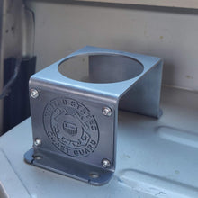 Load image into Gallery viewer, Steel cup holder with US Coast Guard logo in rear of Jeep Wrangler YJ