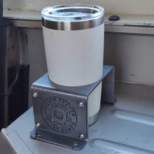 Load image into Gallery viewer, Steel cup holder with US Coast Guard logo in rear of Jeep Wrangler YJ