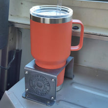 Load image into Gallery viewer, Steel cup holder with US Coast Guard logo in rear of Jeep Wrangler YJ