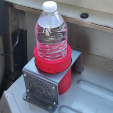Load image into Gallery viewer, Steel cup holder with US Coast Guard logo in rear of Jeep Wrangler YJ