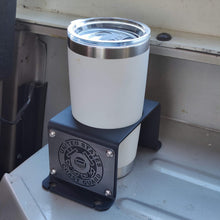 Load image into Gallery viewer, Steel cup holder with US Coast Guard logo in rear of Jeep Wrangler YJ