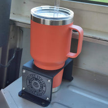 Load image into Gallery viewer, Steel cup holder with US Coast Guard logo in rear of Jeep Wrangler YJ