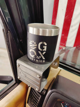 Cargar imagen en el visor de la galería, Black coffee cup in metal cup holder that has a Puerto Rican flag design mounted in TJ Jeep