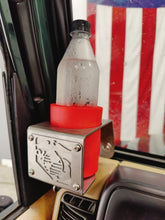 Cargar imagen en el visor de la galería, Plastic bottle in a red coozie inside metal cup holder with USMC logo mounted on drivers side of TJ Jeep Wrangler
