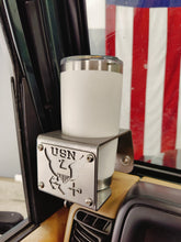 Cargar imagen en el visor de la galería, White yeti tumbler inside metal cup holder with USN logo mounted on drivers side of Jeep Wrangler TJ