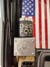 Cargar imagen en el visor de la galería, Black travel coffee mug with Dog Fox Industries logo inside metal cup holder that has USCG logo mounted on drivers side of TJ Jeep Wrangler