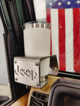 Cargar imagen en el visor de la galería, White travel mug in metal cup holder that has a "Jeep Dog" logo design mounted in TJ Jeep