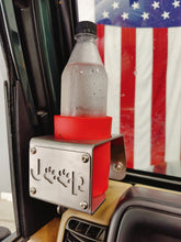 Cargar imagen en el visor de la galería, plastic bottle in a red coozie in metal cup holder that has a "Jeep Dog" logo design mounted in Jeep TJ