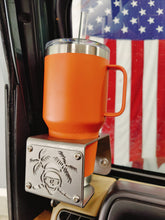 Carica l'immagine nel visualizzatore di Gallery, Orange drink cup in metal cup holder that has skull and palm tree logo mounted in TJ Jeep