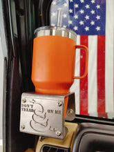 Carica l'immagine nel visualizzatore di Gallery, Metal made in the USA cup holder with "Don't Tread On Me" logo installed in TJ Jeep